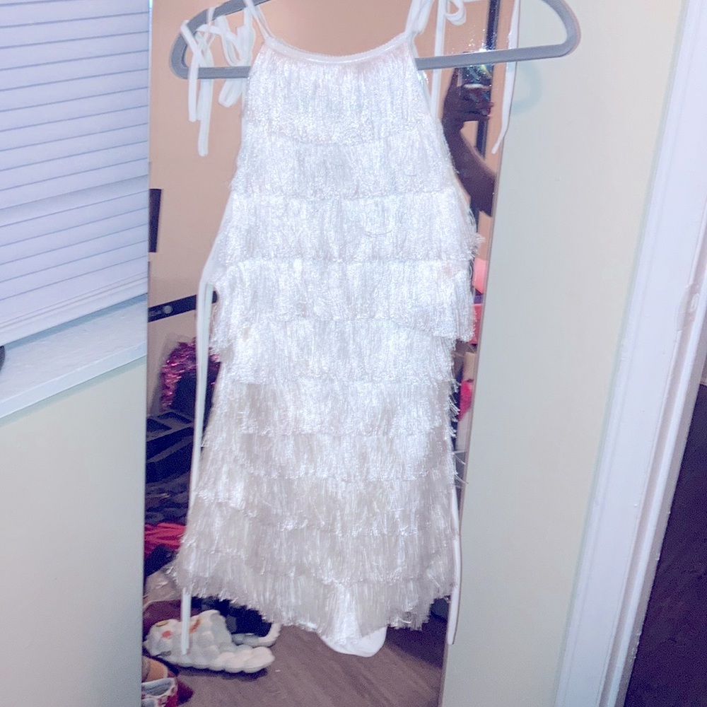 White blackout luxury dress size small and very new and vey elegant